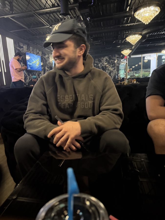 Abdul laughing at a lounge